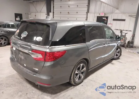 2018 Honda Odyssey Touring z USA, uszkodzony, nr VIN 5FNRL6H86JB007596